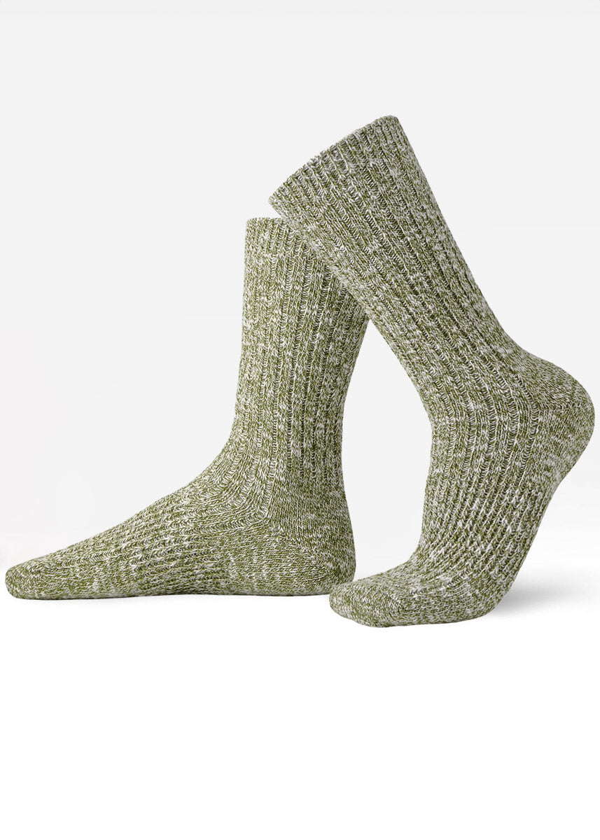 Green slouch crew socks with a ribbed slub-knit texture and mottled, heathered coloring.