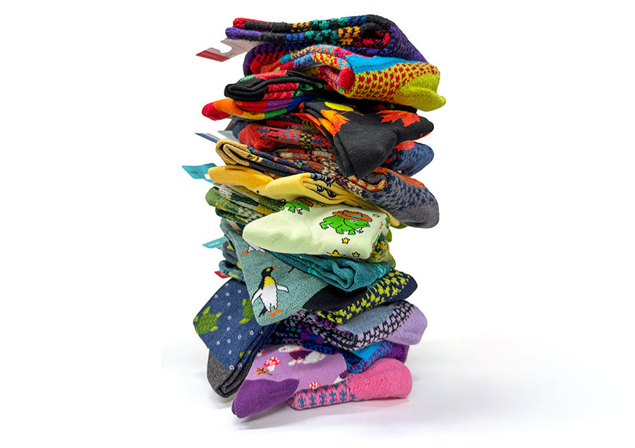 A stack of colorful, crazy socks.
