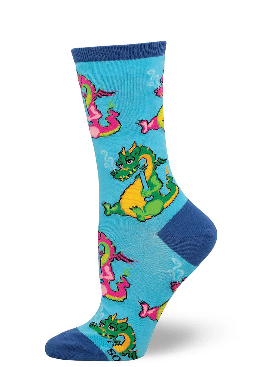 Blue novelty crew socks for women with a pattern of colorful dragons holding bongs and blowing smoke out of their nostrils.