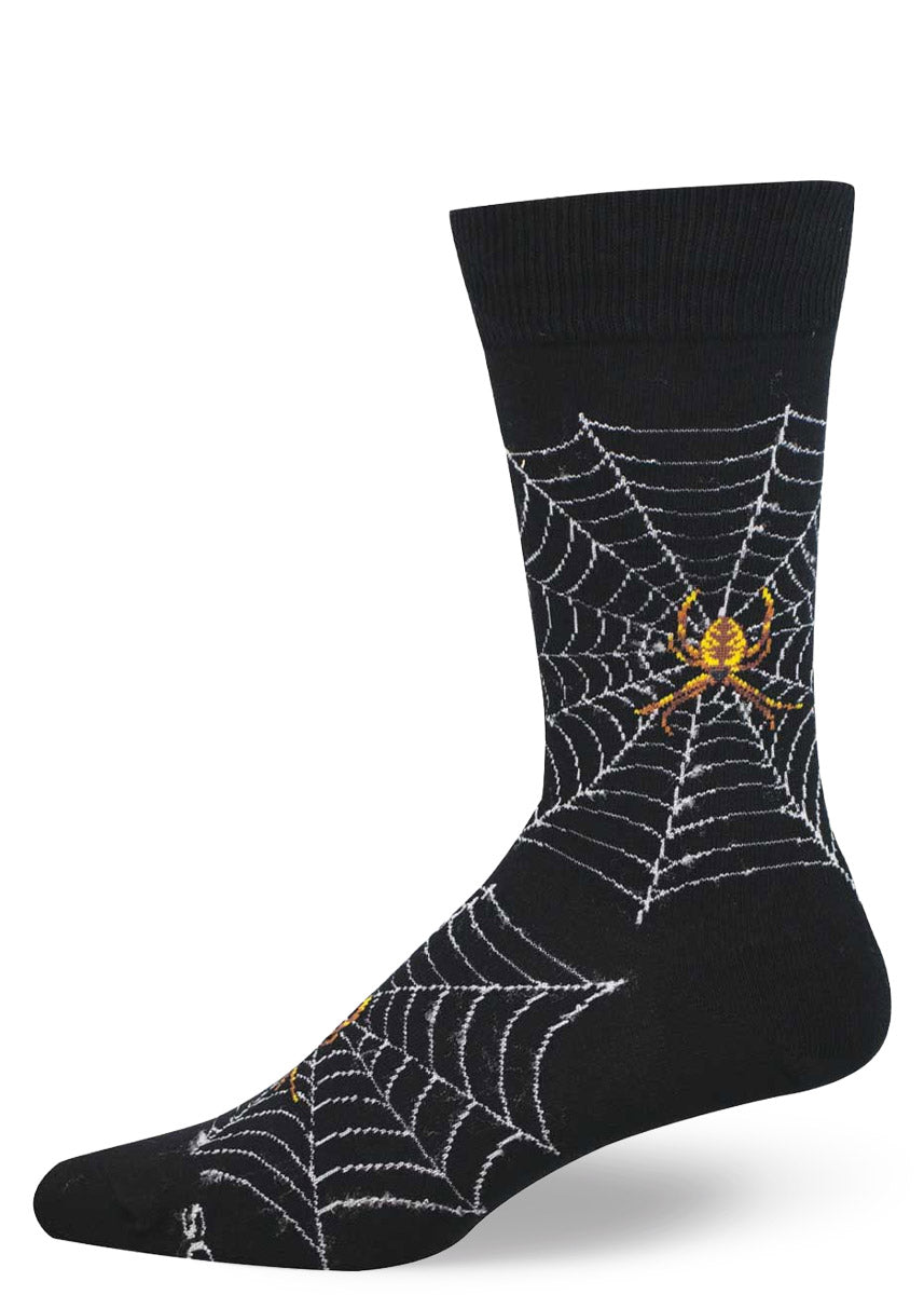 Black men's crew sock with spider web and spider design on a white background