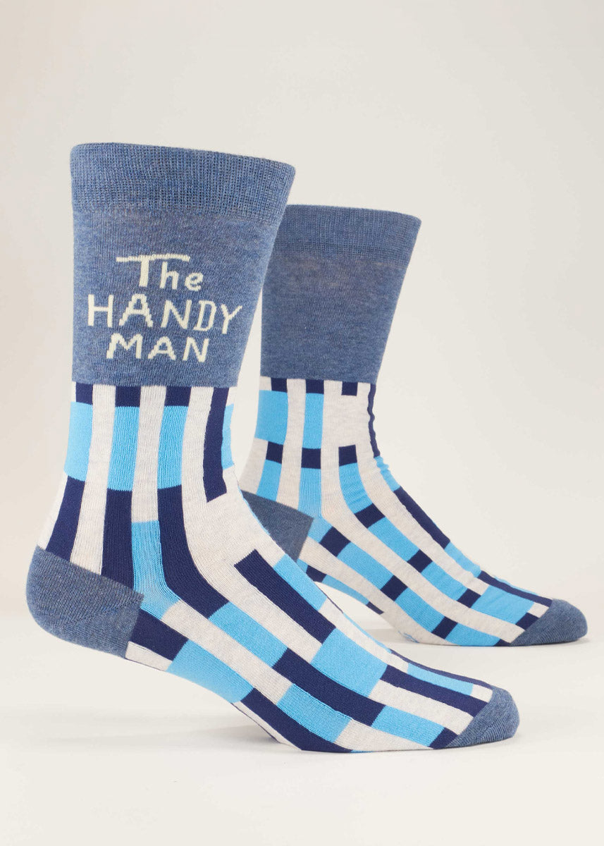 Blue and white crew socks for men that say &quot;The Handy Man&quot; on them and have a geometric striped pattern.