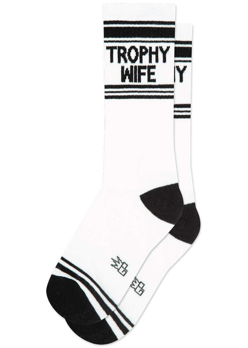 White retro gym socks with black stripes and the phrase "TROPHY WIFE" on the leg.