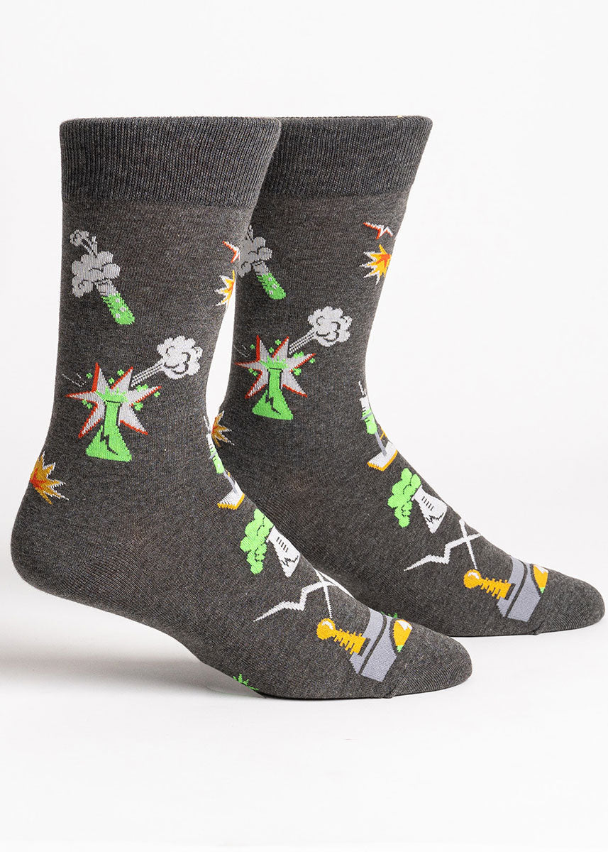 Gray science-themed crew socks for men with a pattern of exploding beakers, test tubes, and bolts of lightning. 