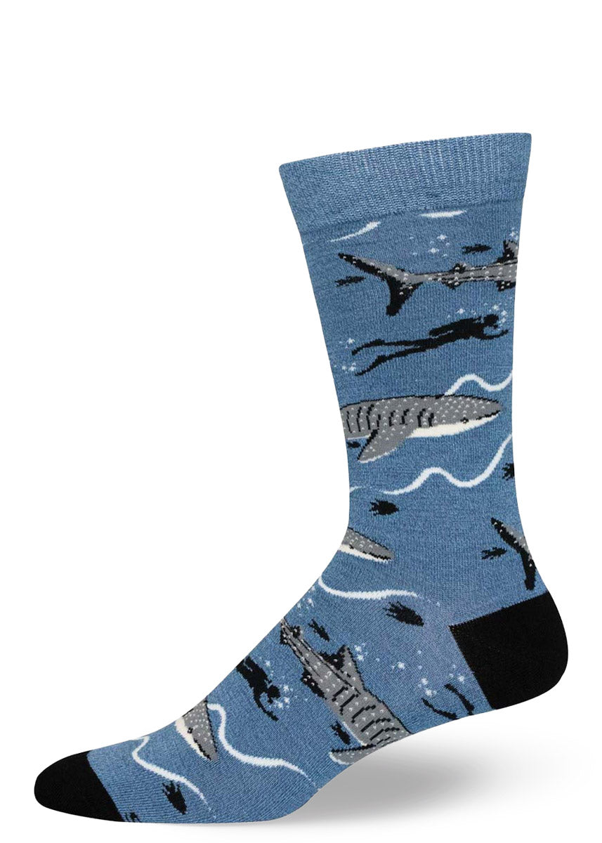 Blue men's crew sock with whale shark pattern on a white background.