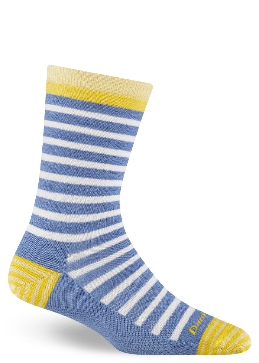 Wool socks for women feature a light blue and white striped pattern with yellow accents.