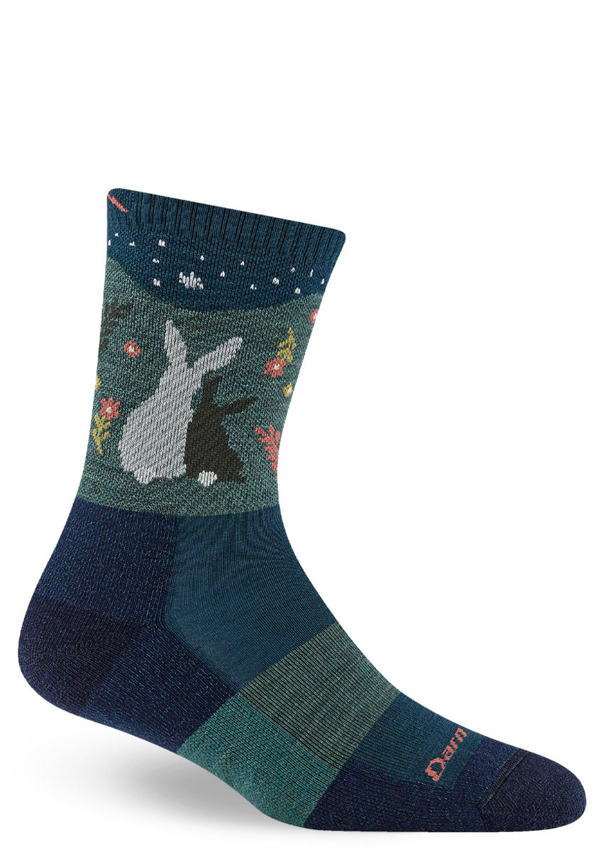 Wool women's crew sock in green and navy with a rabbit design on a white background.