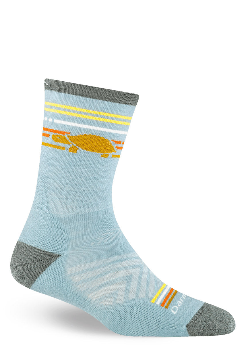 Light blue crew sock with gray accents and an orange tortoise design on a white background.