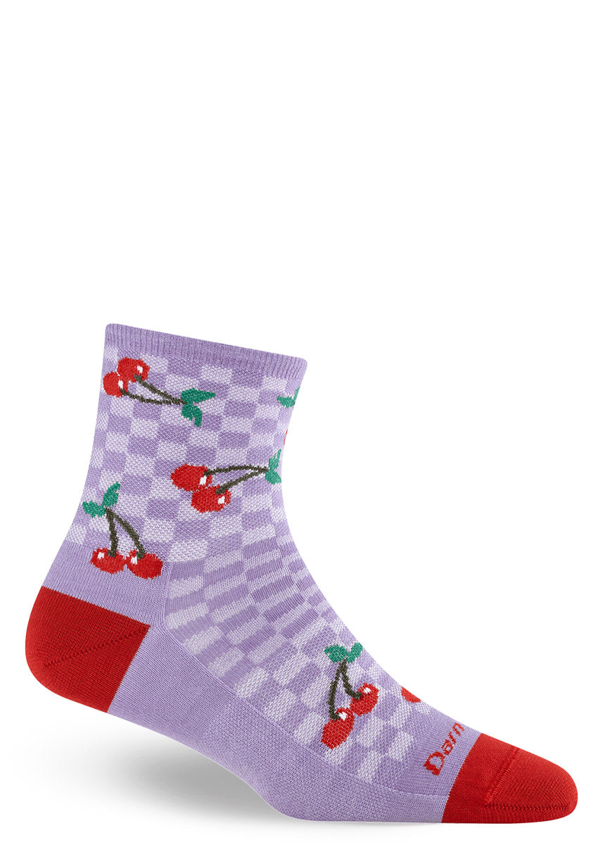 Monochromatic purple-checkered quarter sock with a red cherry design on a white background.