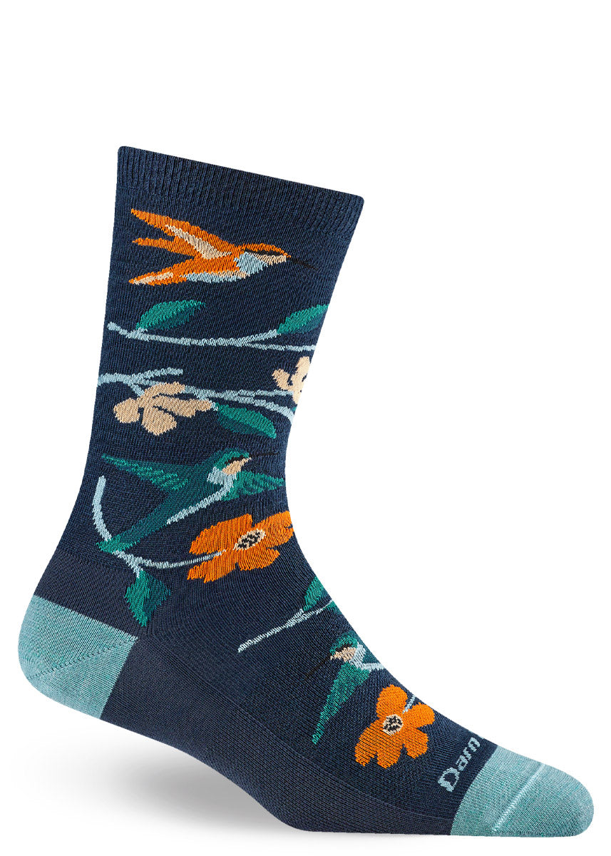 Navy sock with a orange and teal floral design featuring hummingbirds.