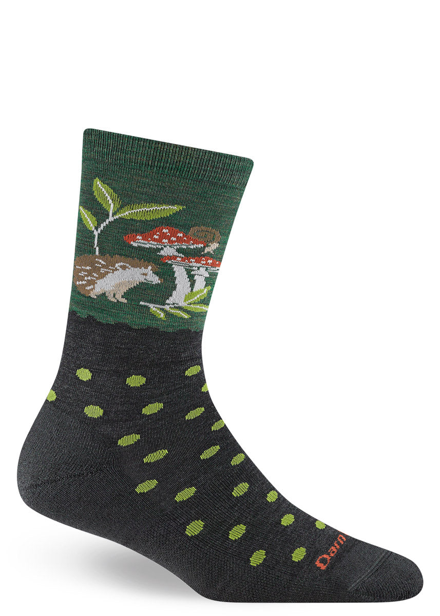 Green wool crew socks with hedgehog, red mushroom and polka dot design.