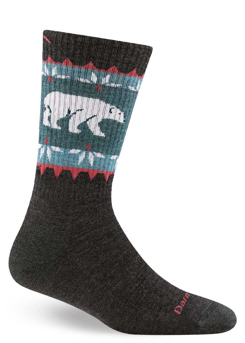 Dark gray hiking boot socks for women with a white polar bear against a blue, red, and white geometric design. 