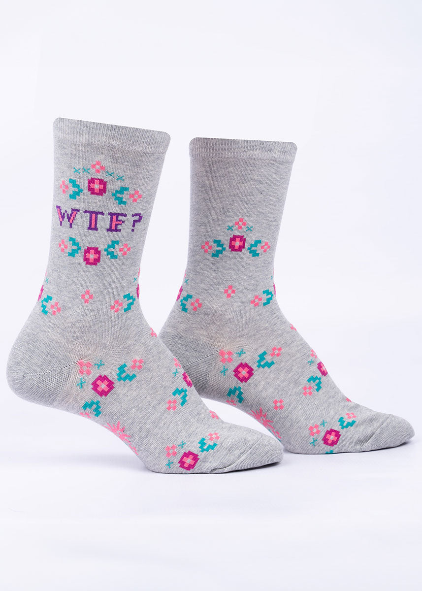 Heather gray women&#39;s crew socks feature pink faux embroidered florals and the expression &quot;WTF?&quot;.