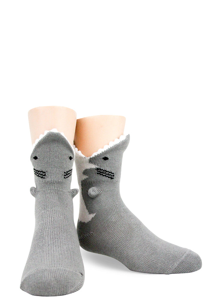 Funny 3D shark socks for kids make it look like a shark is eating your foot!