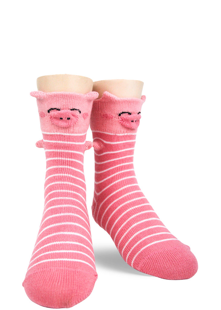 Striped socks for kids make each foot look like an adorable pink pig with 3-D snout, nose, and trotters!