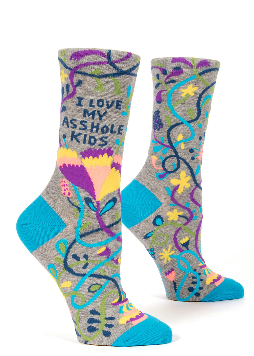 These funny socks for moms say &quot;I Love My Asshole Kids.&quot;