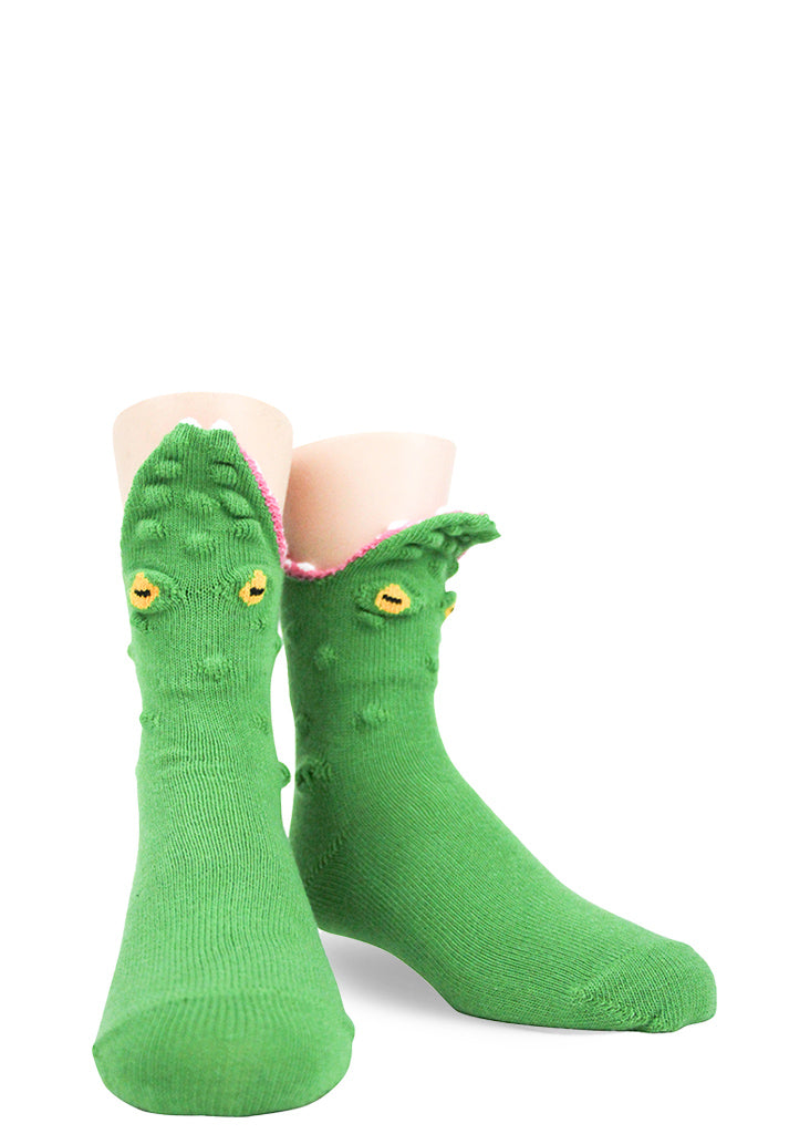 Green alligator socks for kids in 3D look like they are eating your feet!