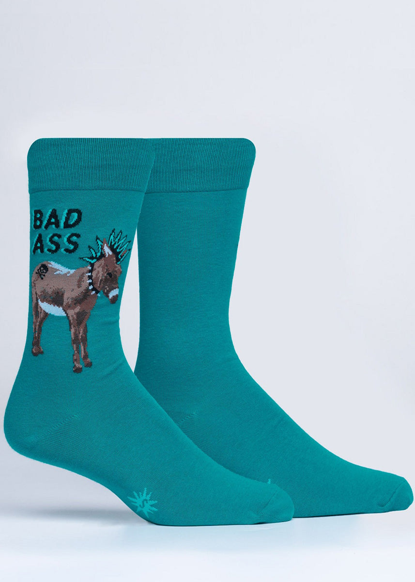 Funny socks for men show a donkey with a mohawk and a spiked choker with the words "Bad Ass" and a teal background.