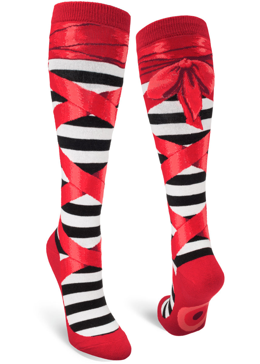 Knee high socks for women outfit your legs in ruby red ballet slippers with red ribbons tied up to the knee!