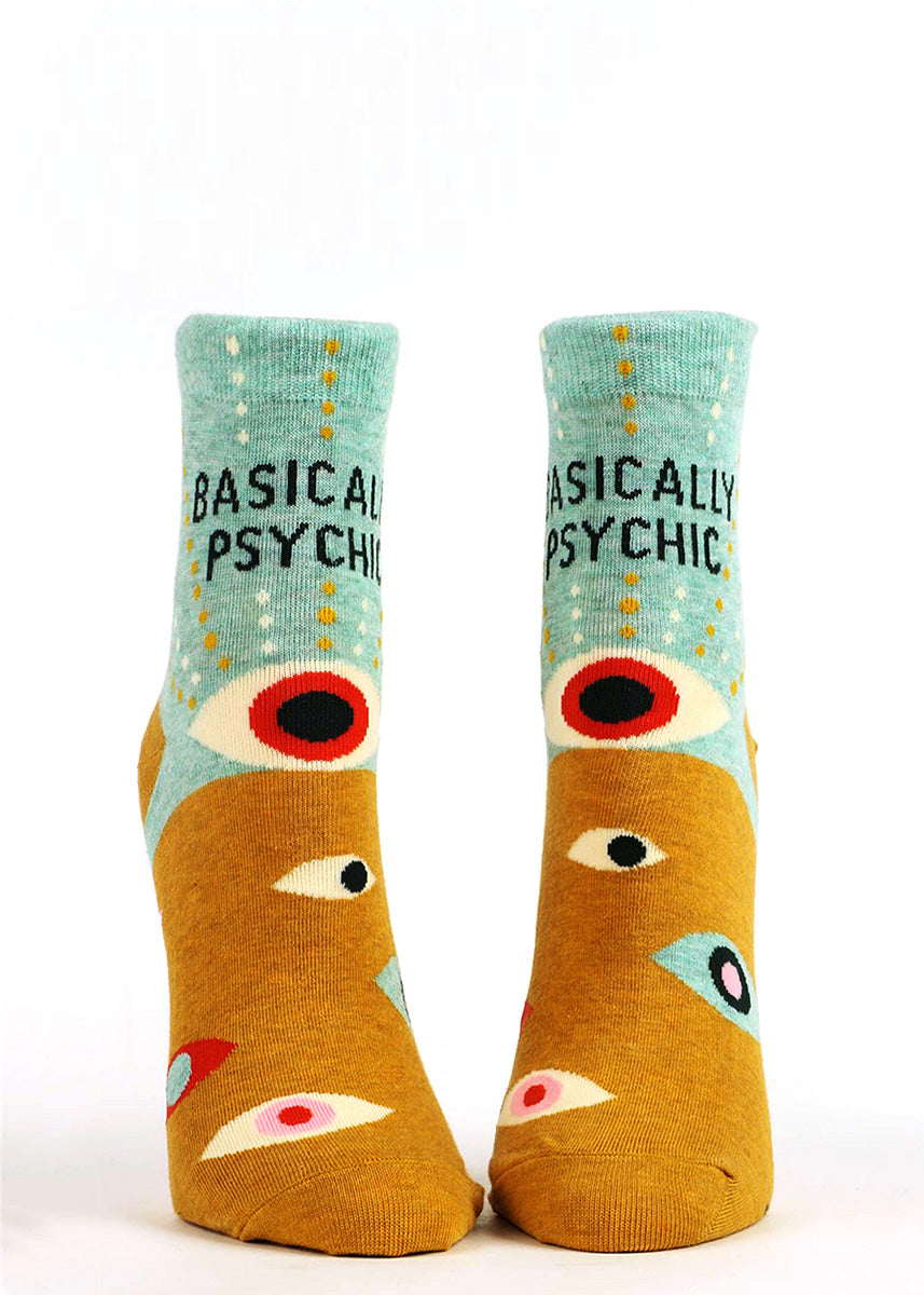 Funny ankle socks feature a design of abstract eyes with the words, "Basically Psychic."