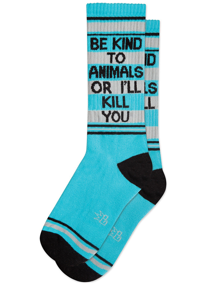 Funny unisex gym-style socks say "Be kind to animals or I'll kill you" on a light blue background with silver stripes.