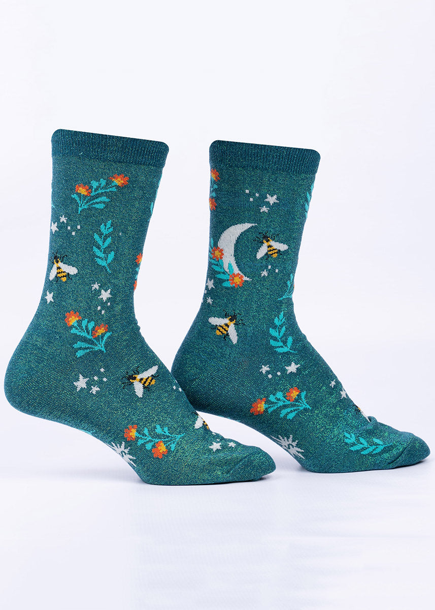 Teal women&#39;s crew socks with shimmer thread, embellished with a pattern of bees, crescent moons, stars and flowers.