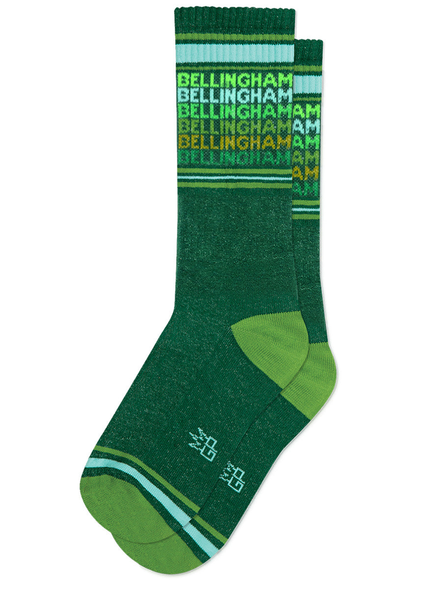 Retro gym socks feature the city &quot;Bellingham&quot; repeated on the cuff in green fonts on a dark green background.