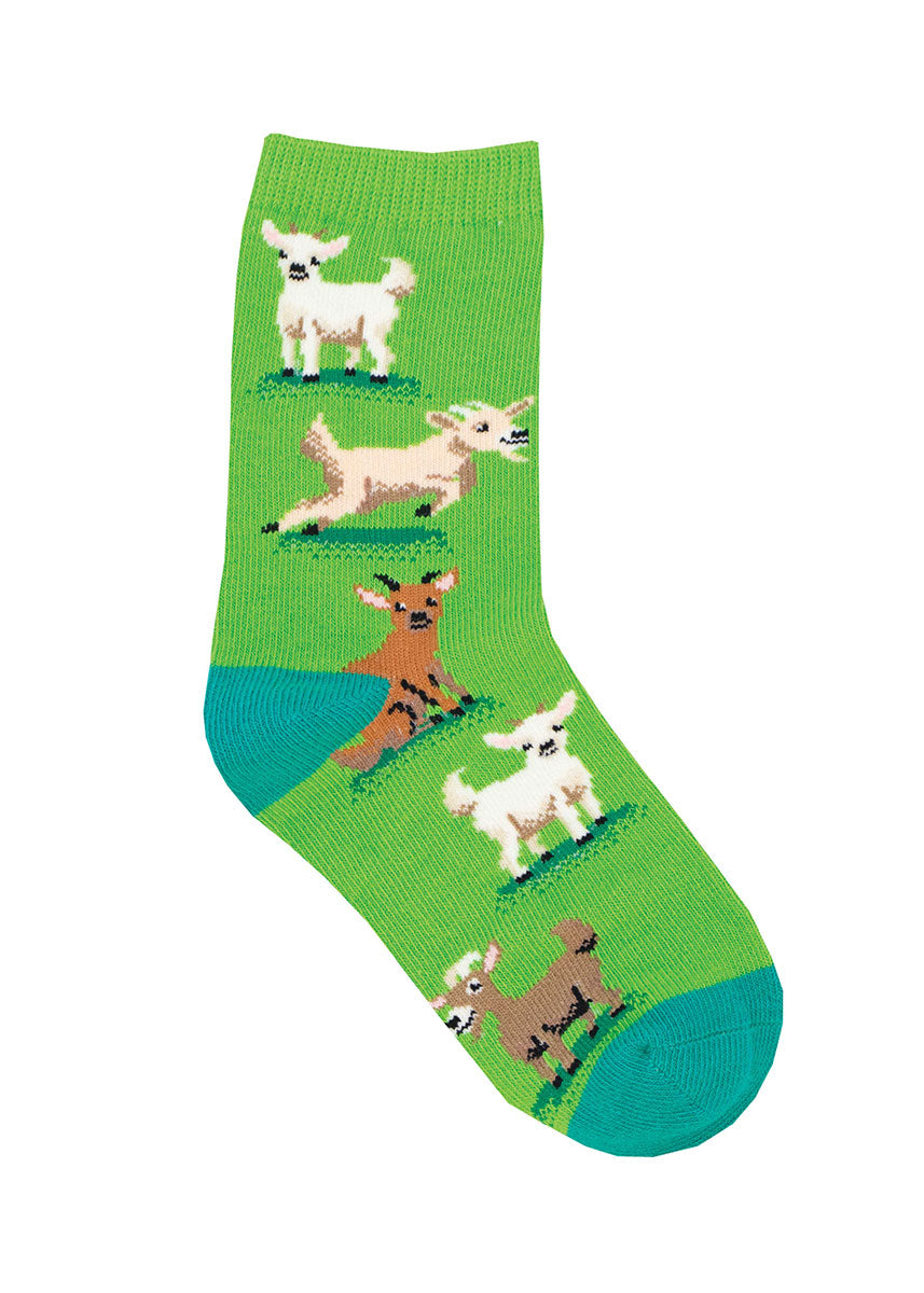Green kids crew socks with a pattern of different color goats, including white, cream and brown.