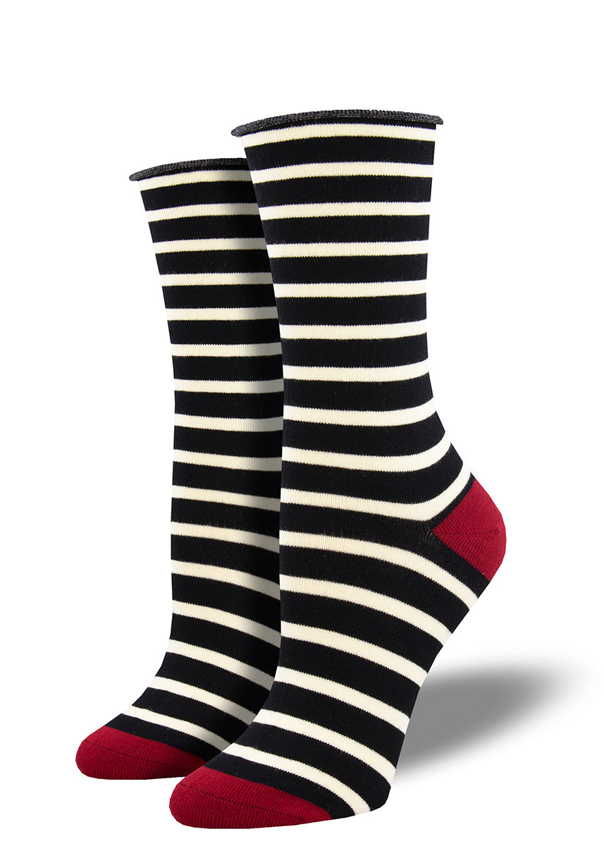 Bamboo socks for women feature black and white stripes with a roll-top cuff.