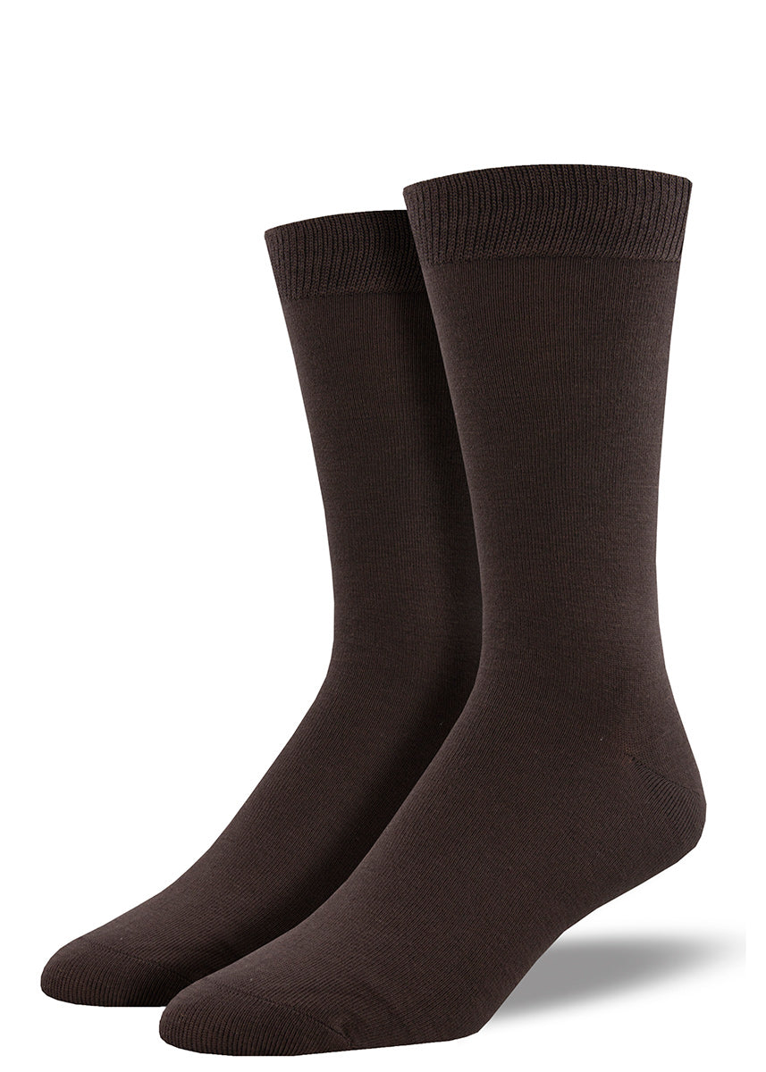 Solid dress socks for men come in a dark brown and are made of super soft bamboo.