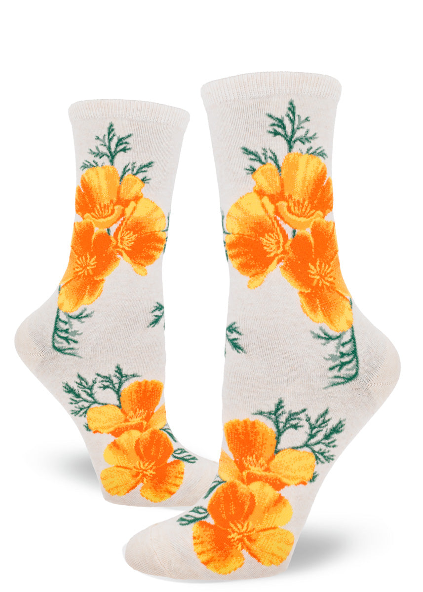 Heather cream women&#39;s novelty crew socks with a pattern of California poppy flowers.
