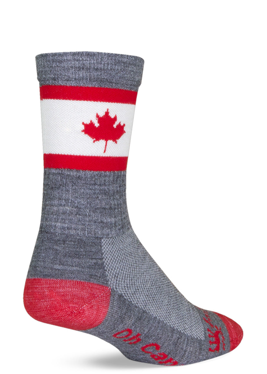 Wool socks feature the Canadian flag with a red maple leaf and say &quot;Oh Canada&quot; on the bottom of the foot.