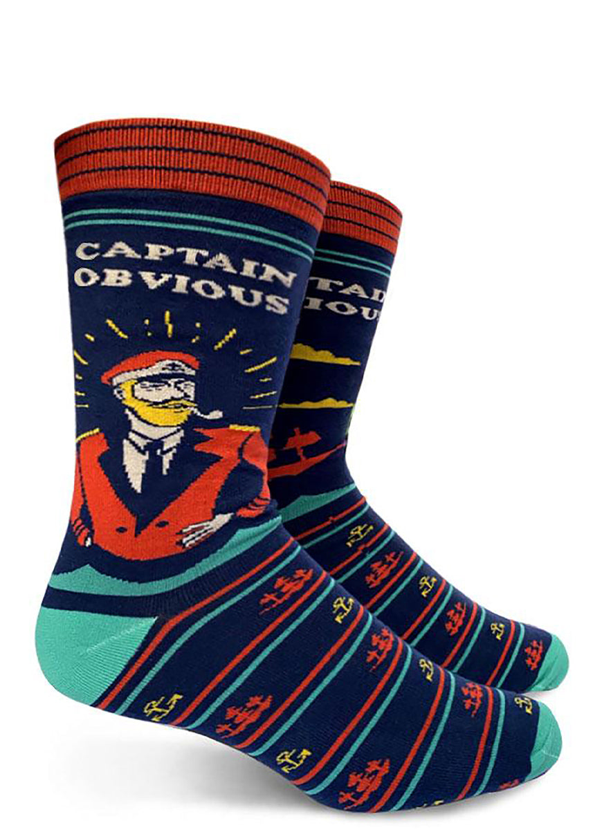 Funny socks for men feature a sea captain smoking a pipe with the words "Captain Obvious" and background icons of anchors and ships.