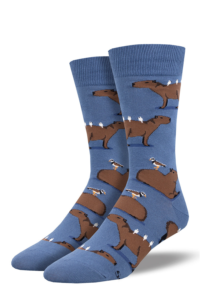 Blue men&#39;s crew socks featuring a pattern of capybaras with various birds perched on their backs.