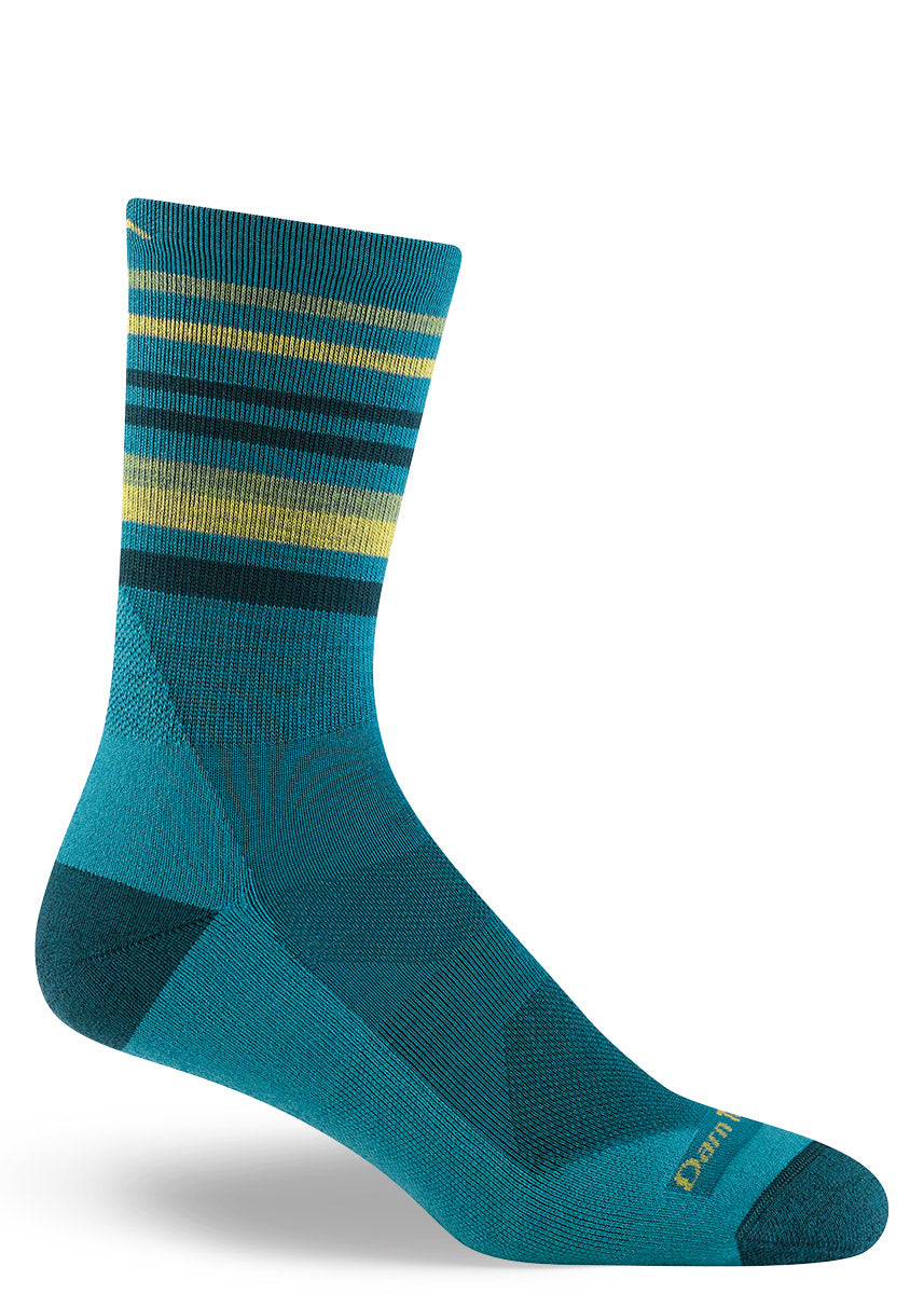 Bright blue hiking socks for men with dark blue and yellow stripes at the cuff and a dark blue heel and toe.