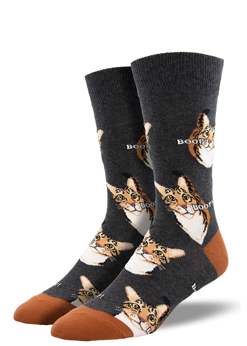 Cat socks for men feature realistic cat busts with the word "Boop!" next to their noses.