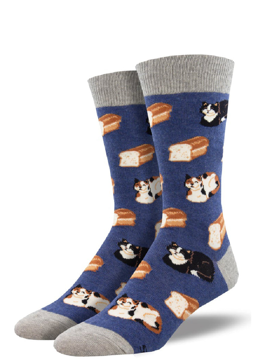 Funny socks for men embellished with a pattern of cats laying in a pose that resembles a loaf of bread.