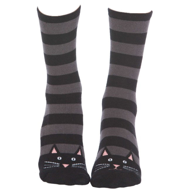 Cute slipper socks for women with cat faces on the toes and non-slip grippers on the bottom.