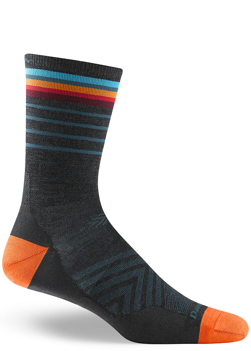 Charcoal wool blend crew-length running socks with a colorful pop of rainbow stripes at the cuff.