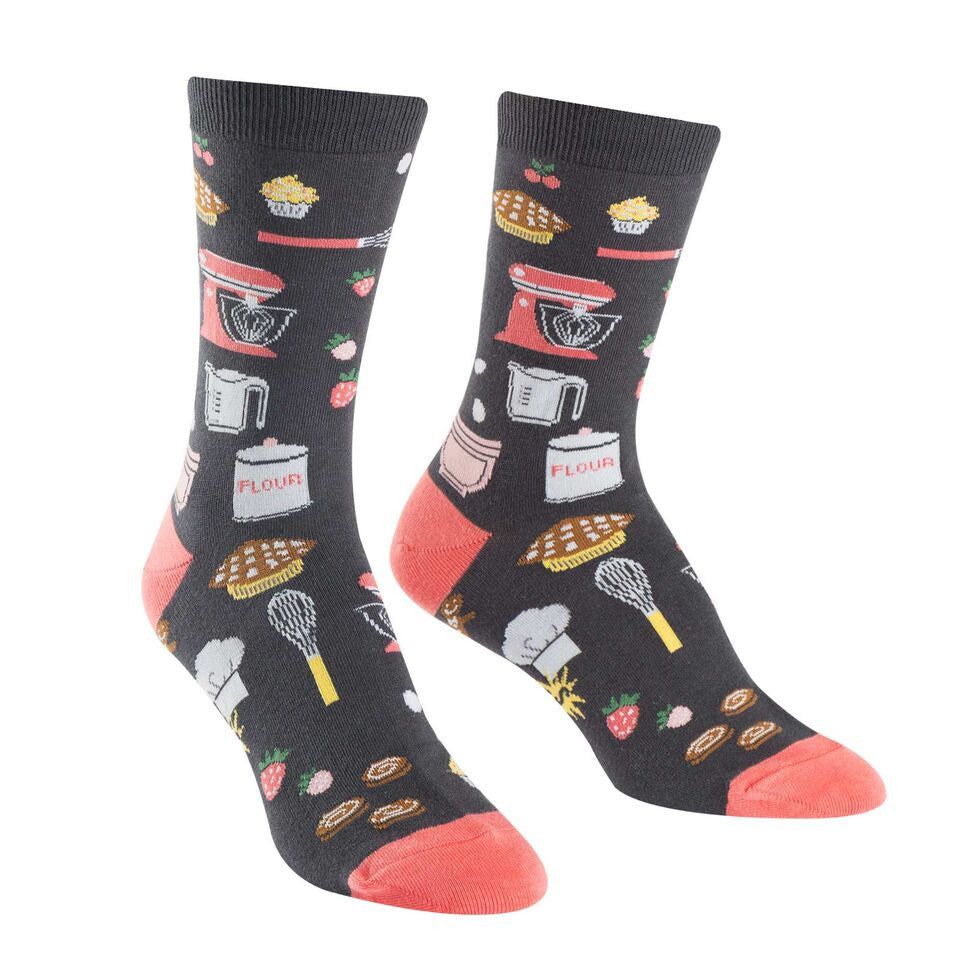 These cooking socks for women are covered with baking supplies like mixers, whisks, eggs and other kitchen stuff 