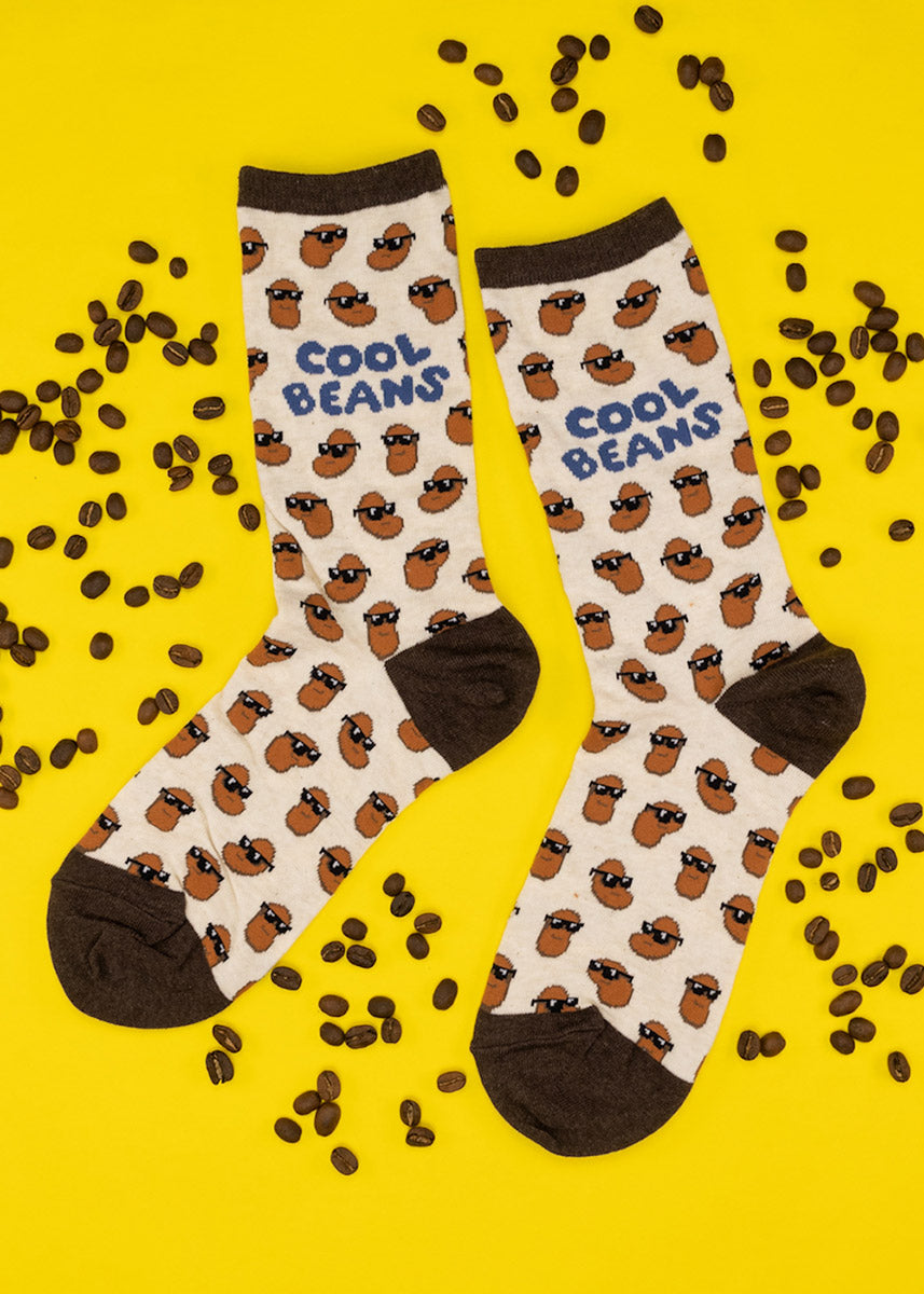 Funny crew socks for women feature brown beans wearing sunglasses with the words, &quot;Cool Beans.&quot;