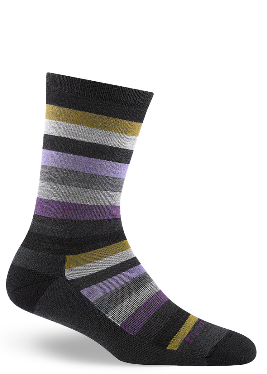 Wool socks for women feature a cushioned footbed and a striped design of grays, purples, and gold. 