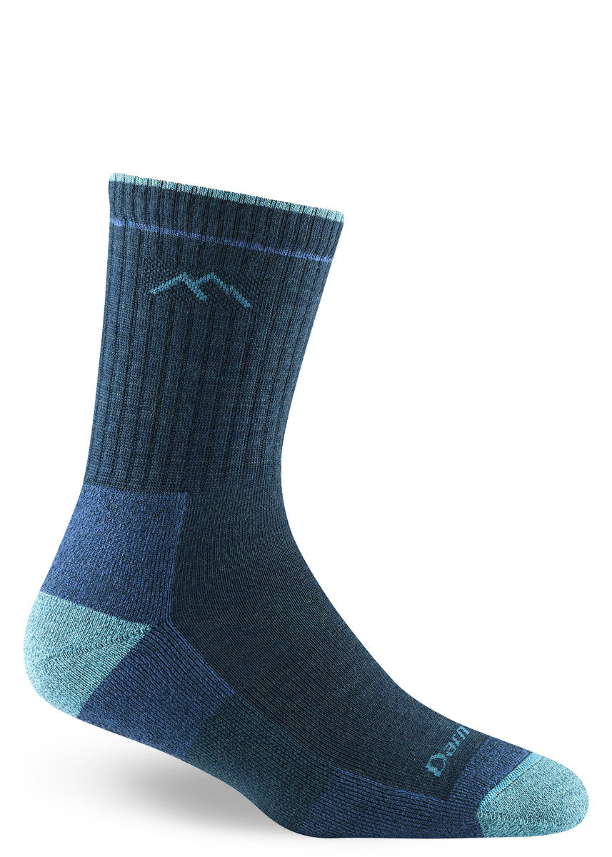 Dark teal blue cushioned crew hiking socks made from merino wool.