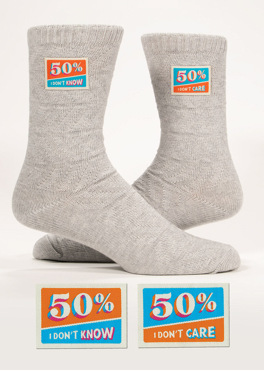 Light heather gray organic cotton socks knit with a textural chevron pattern and embellished with small decorative stitched-on tags that proudly proclaim “50% I don't know, 50% I don't care.”