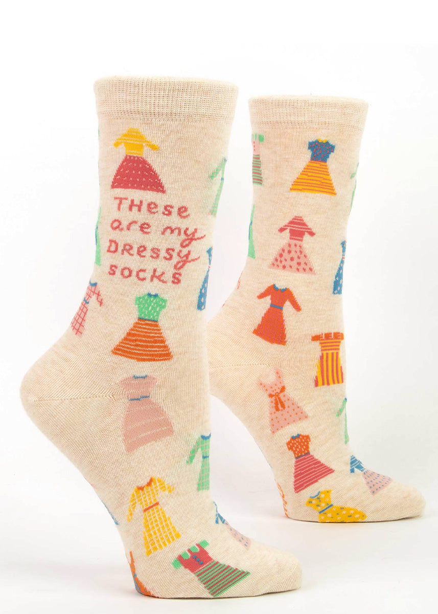 Funny crew socks for women are covered in colorful pattered dresses with the words, &quot;These are my dressy socks.&quot;