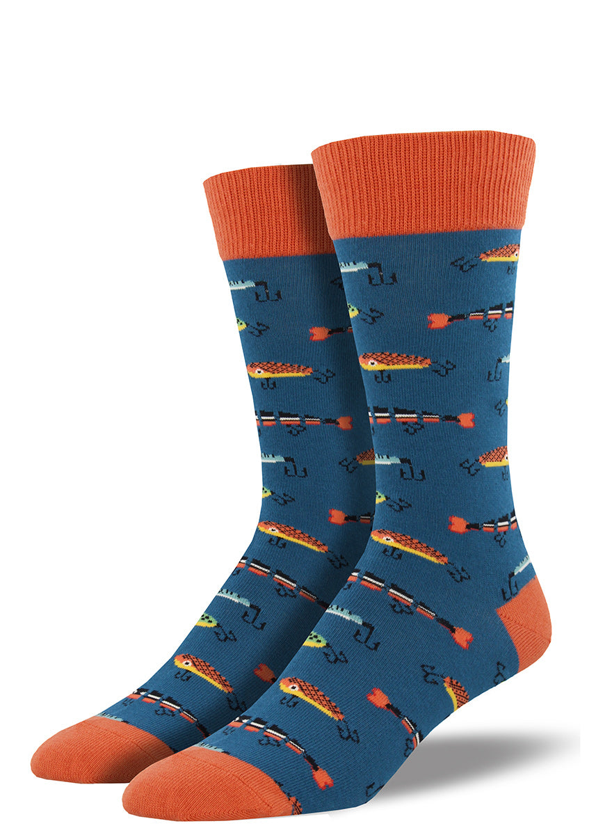 An assortment of colorful fishing lures on a blue men&#39;s crew sock.