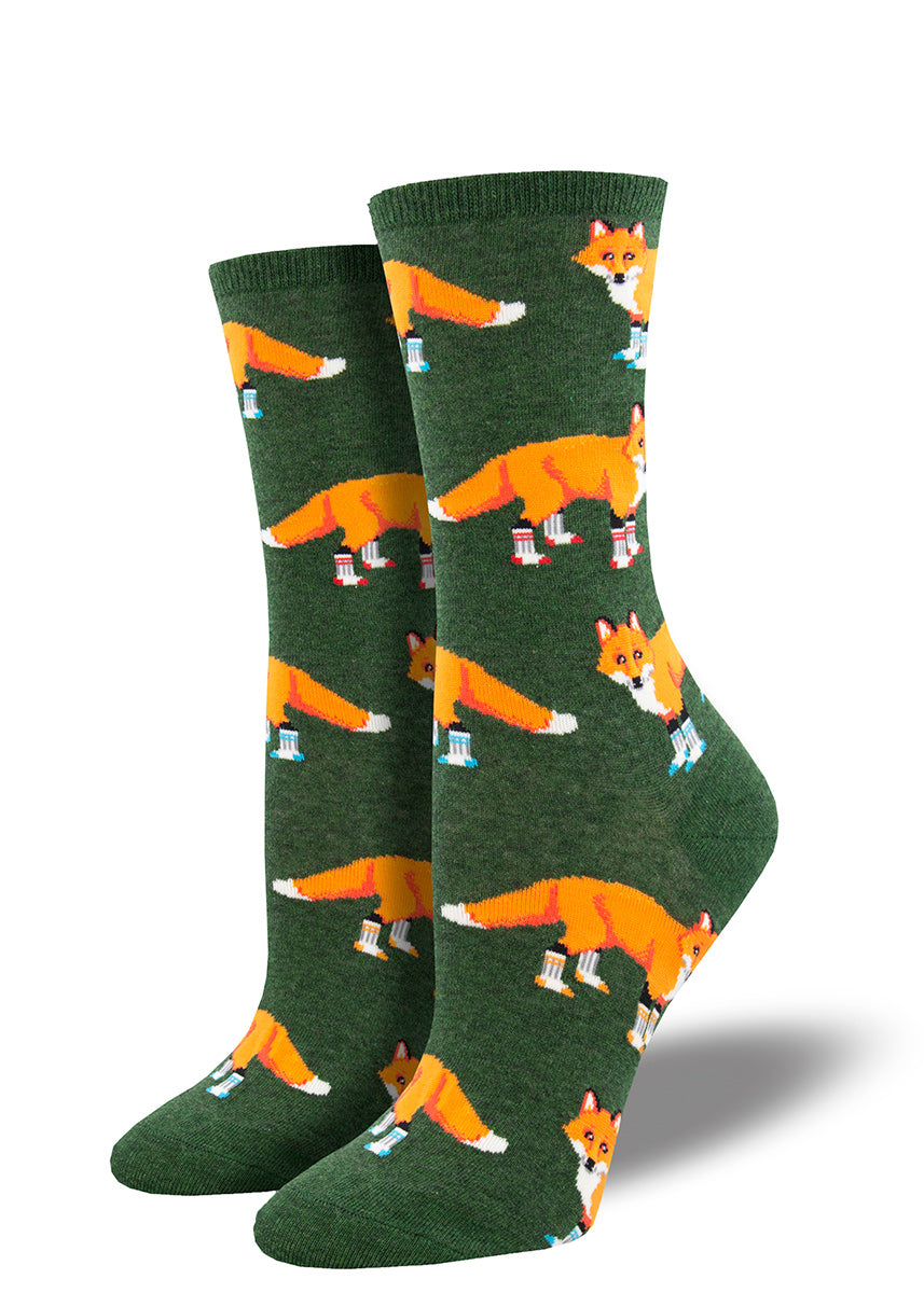 Crew socks for women show orange foxes wearing socks on all four legs.