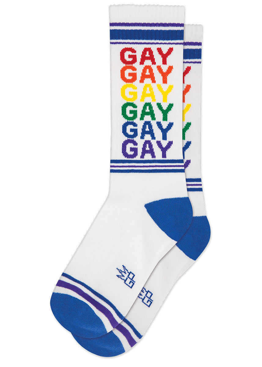 Retro-inspired sport socks feature blue and purple stripes with the word "GAY" repeated in every color of the rainbow!
