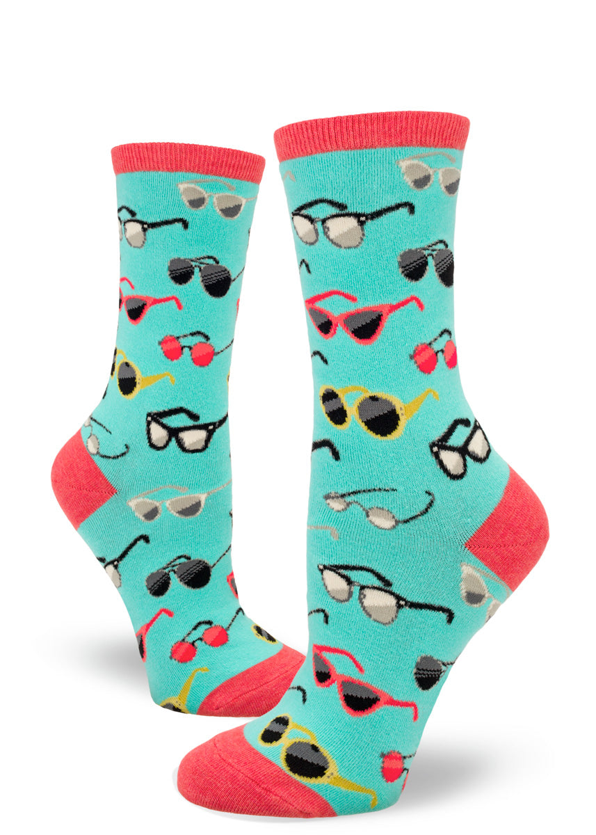 Fun turquoise blue socks for women are covered in different styles of sunglasses! 