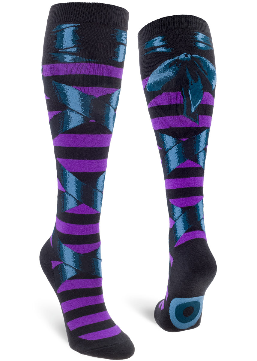 Halloween knee socks feature dark blue ribbons tied around black and purple stripes!