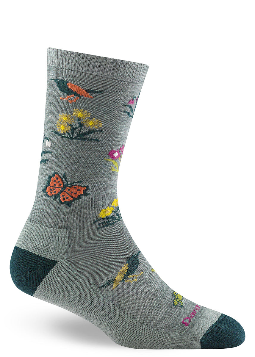 Cute and cozy wool socks with a pattern of butterflies, flowers and birds, and a lightly-cushioned sole.